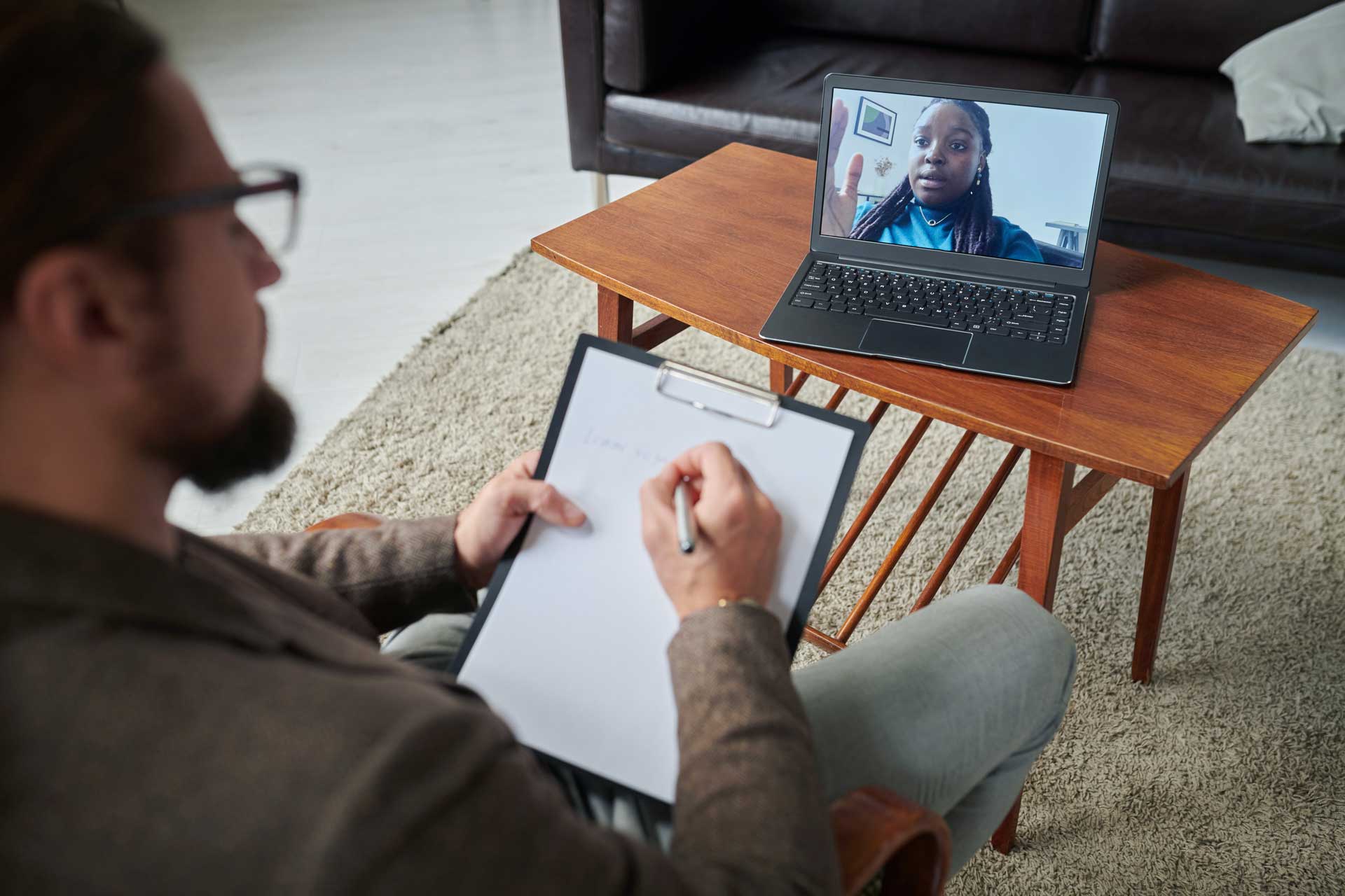 Man receiving telehealth conference